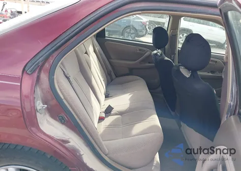 2000 Toyota Camry Le z USA, uszkodzony, nr VIN JT2BG22K2Y0511664